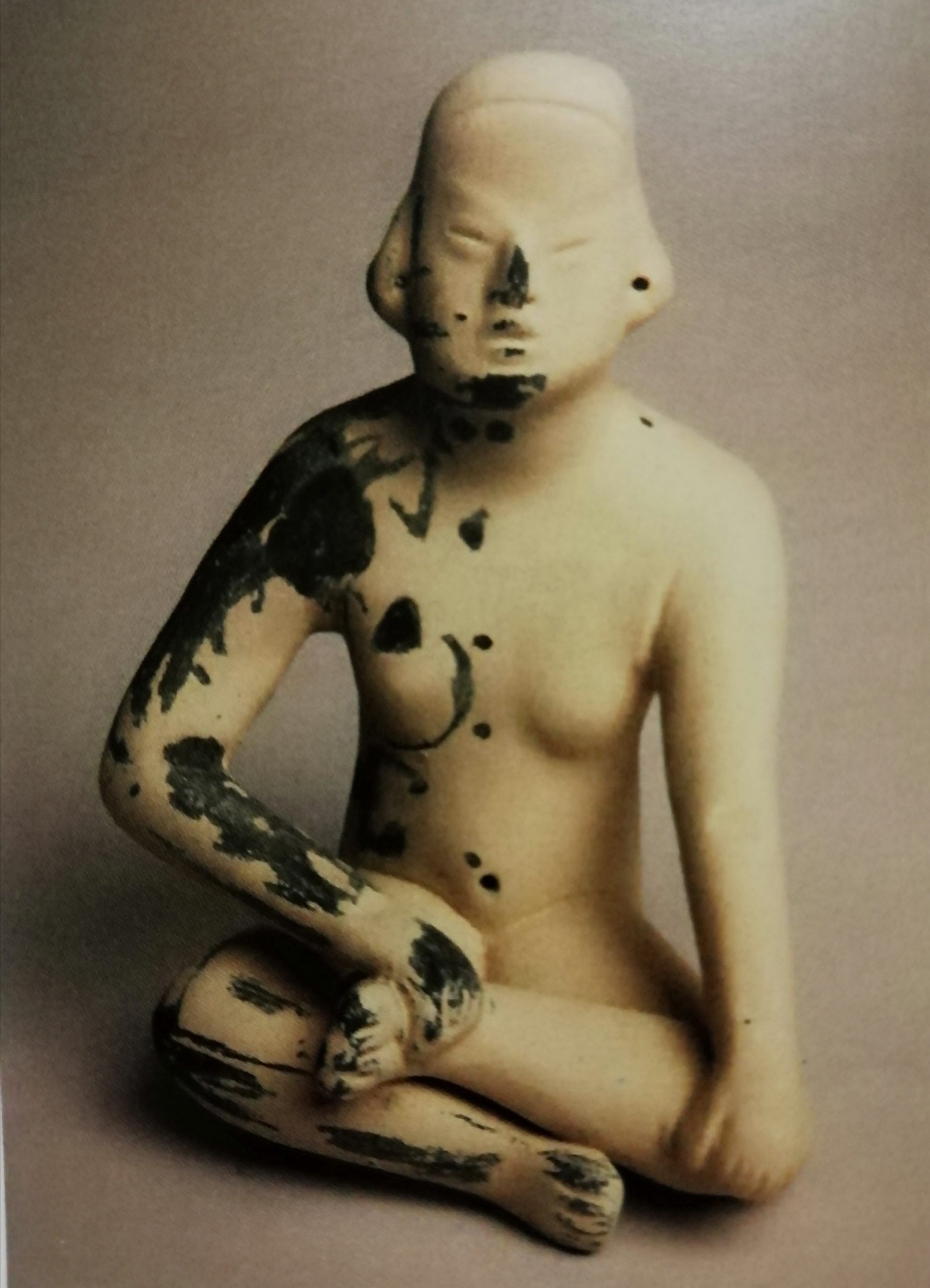 PERSONAJE SEDENTE